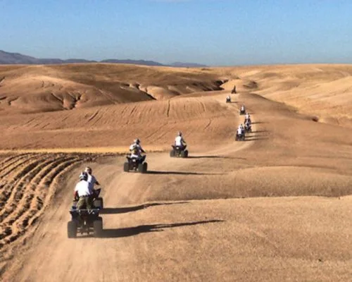 Agafay Desert Activities - Morocco Friendly Travel Quad bikes on a desert track in Agafay