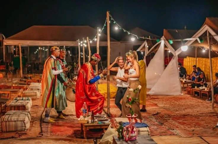 Marrakech Nightlife and Desert Dinner Shows Guide 1 Traditional dancers at a desert dinner show