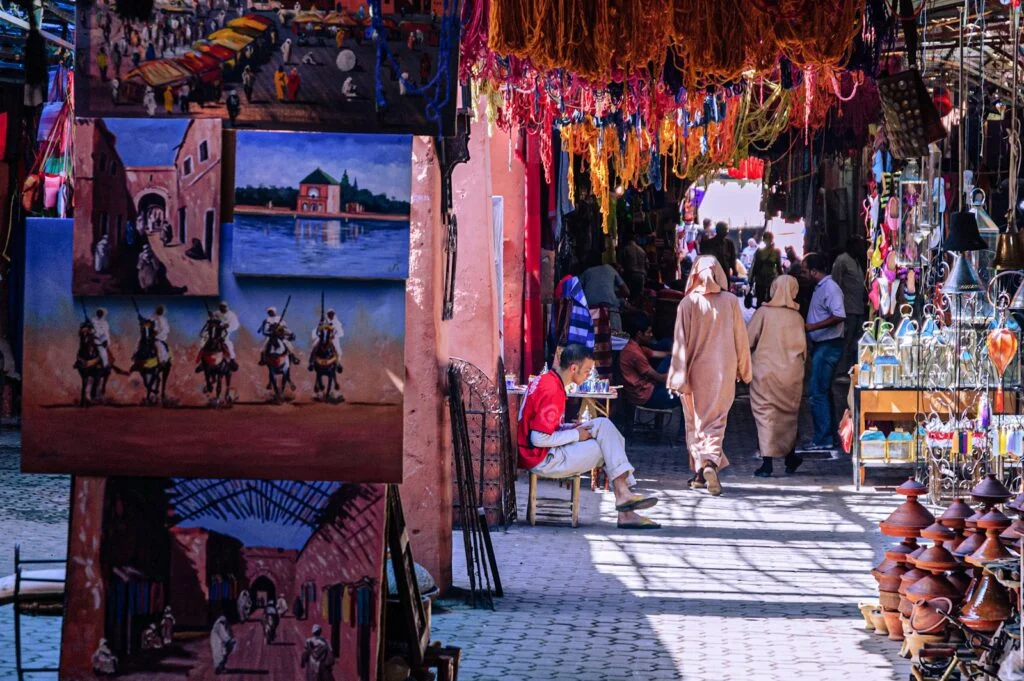 Budget Travel Guide to Morocco 1 Shoppers in a busy Marrakech souk